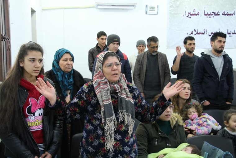 Image: Worshippers at the Church of the Brethren in Kobani, Syria.