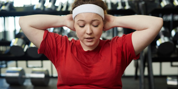 Woman Sweating In Gym