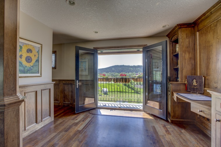 The home boasts stunning mountain and lake views. 