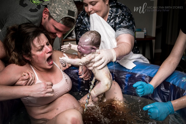 Many moms can understand the look on this mom's face after delivering her baby. This relatable moment helped the image win second place in the out of hospital birth pictures of the 2019 Birth Becomes Her Image Contest.