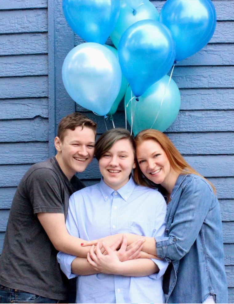 Adrian Brown (center) first came out as transgender to his brother, Lucas (left), who celebrated his "gender reveal" with their mother, Heather Green.