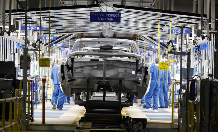Image: The Final Inspection area of the paint area of the assembly line at the General Motors Flint Assembly Plant where the new 2020 Chevy Silverado HD is being built