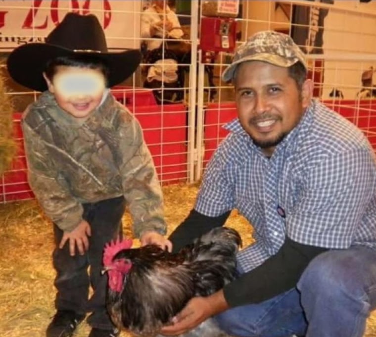 Image: Ulises Valladares with his son, Junior. Photo blurred by source.