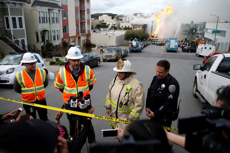 Image: Firefighters battles a fire after a gas line explosion in San Francisco