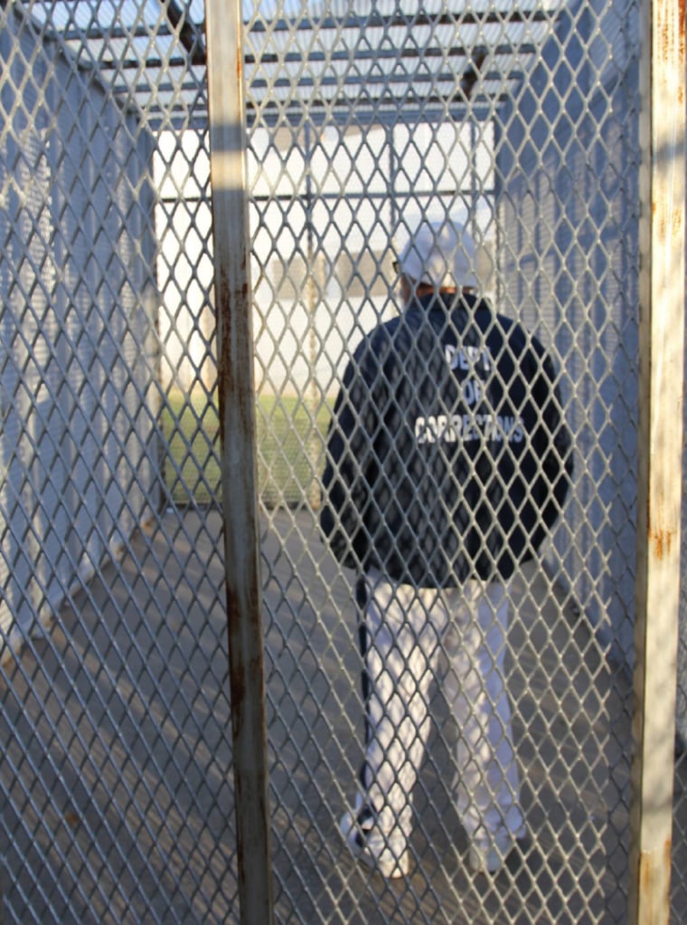 Image: An inmate in a standard SMU recreation cage.