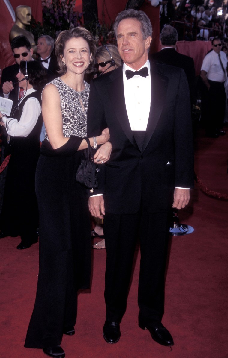 Actress Annette Bening and actor Warren Beatty attend the 71st Annual Academy Awards on March 21, 1999 at Dorothy Chandler Pavilion, Los Angeles Music Center in Los Angeles, California. (Photo by Ron Galella, Ltd./WireImage)