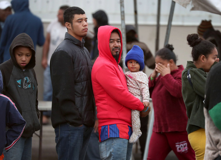 Image: Thousands Of Migrants Wait To Enter U.S At Small Texas Border Crossing