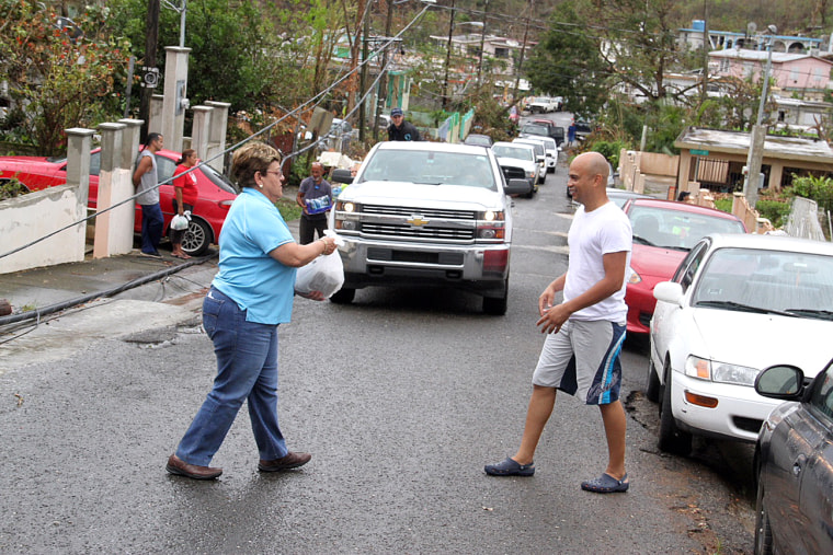 The mayor of Ponce, Puerto Rico, Maria Melendez, with residents recovering after the damages from Hurricane Maria.