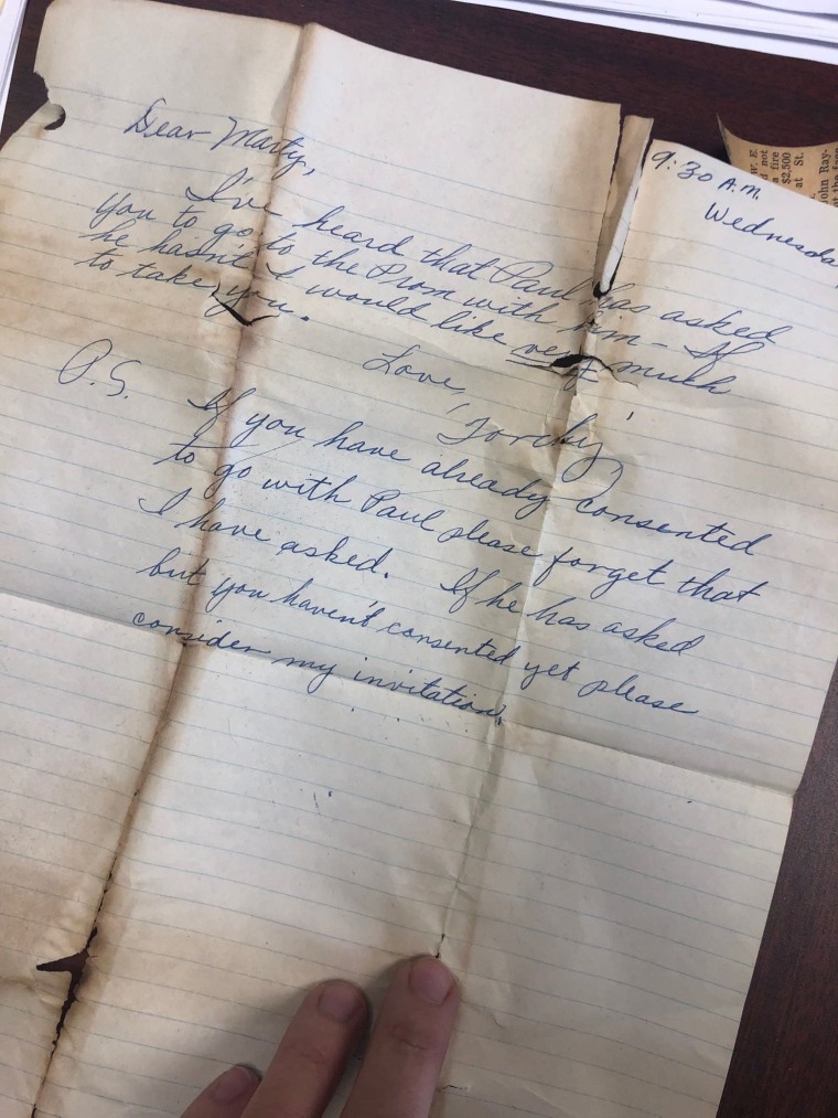 Woman reunited with purse she lost in the 50s