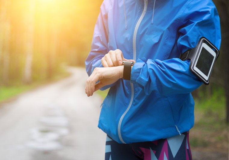 Watch for sports with smartwatch. Jogging training for marathon.