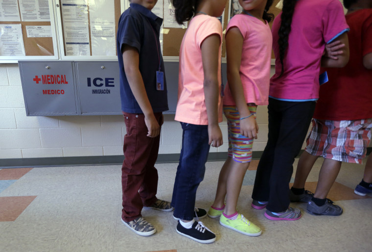 Image: Detained immigrant migrant children detention
