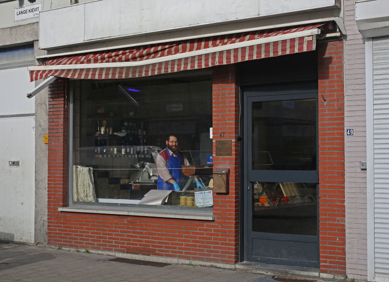 Image: Chaim Goldberg, 32, a butcher in Moszkowitz kosher butchers, in his business in Antwerp