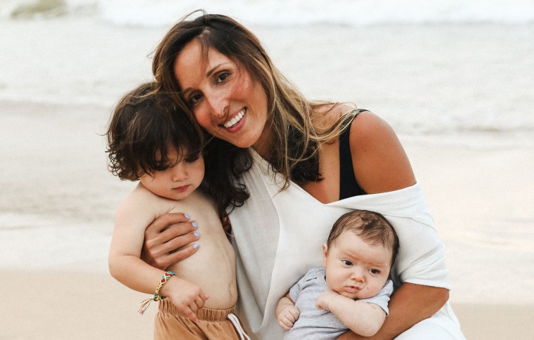 Yasmin Vossoughian with her sons Azur and Noor Clifford.