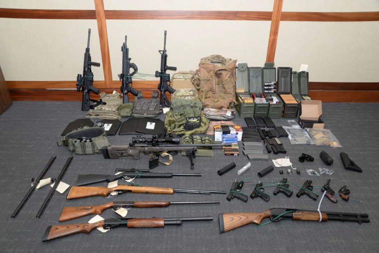 The stockpile of guns found by investigators owned by Christopher Hasson.