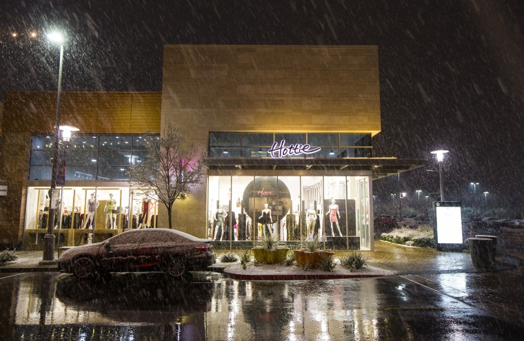 Image: Snow falls around Downtown Summerlin in Las Vegas