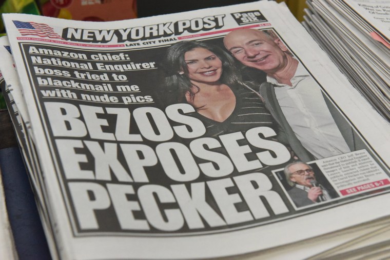 Image: The New York Post with a headline referring to Jeff Bezos is photographed at a convenience store