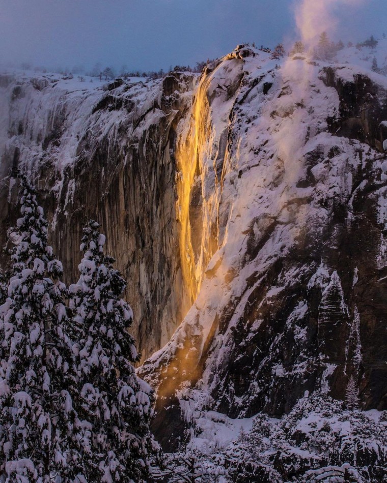 Image: Sunlight hits the Horsetail Fall, turning it into a \"Firefall\", at Yosemite National Park, California