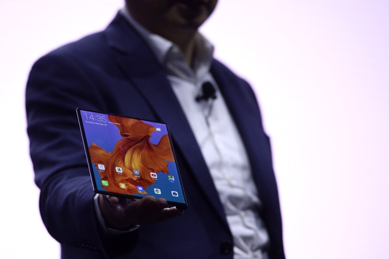 Image: Richard Yu, the CEO of Huawei's consumer products division, holds the Mate X foldable smartphone at the Mobile World Congress in Barcelona on Feb. 24, 2019.