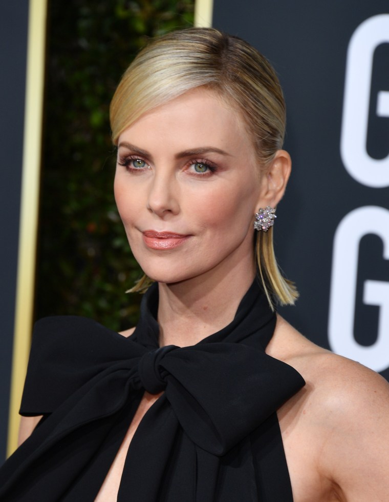 Charlize Theron hair half-updo