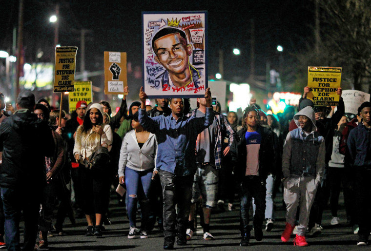 Image: Demonstrators march to protest the police shooting of Stephon Clark, in Sacramento