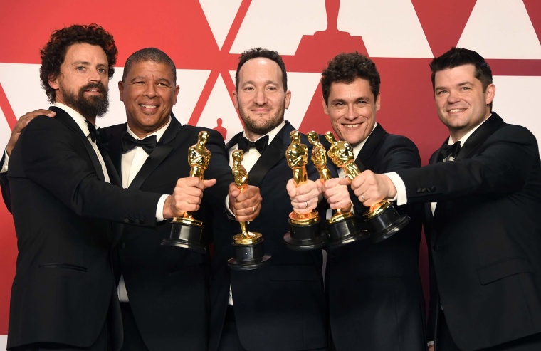 Image: Bob Persichetti, Peter Ramsey, Rodney Rothman, Phil Lord, and Christopher Miller, winners of Best Animated Feature Film for "Spider-Man: Into the Spider-Verse," pose in the press room during the 91st Annual Academy Awards