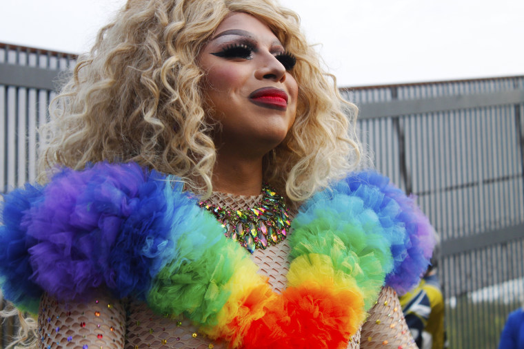 Image: Idra Valencia wears a rainbow colored outfit for her drag performance in Brownsville, Texas.