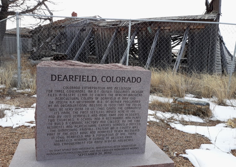 Image: A plaque commemorating the 100th anniversary of Dearfield, Colorado.