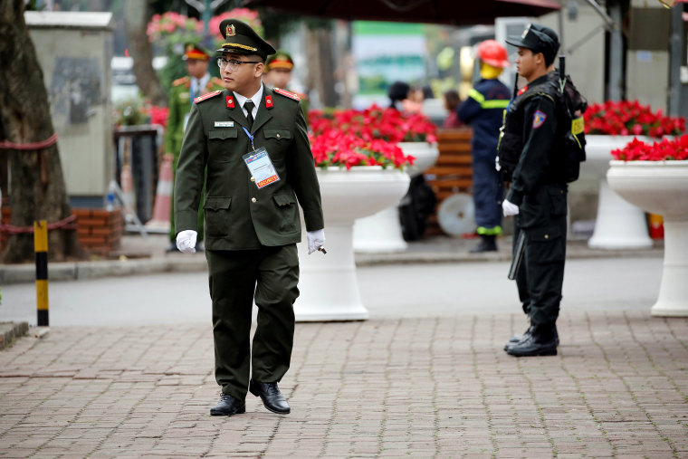 Image: Security officers stand guard at Melia Hotel before the Trump-Kim summit in Hanoi