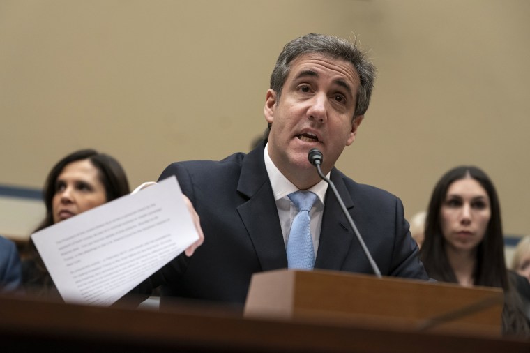 Image: Michael Cohen, former lawyer for President Donald Trump, reads his opening statement during testimony on Capitol Hill on Feb. 27, 2019.