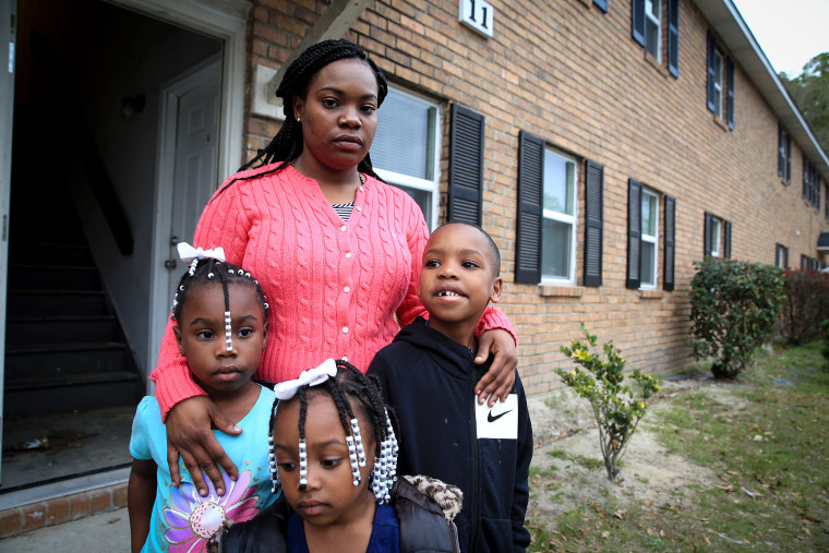 KinTerra Johnson and her three children were evacuated from their home in January after two of their neighbors were found dead of carbon monoxide poisoning.