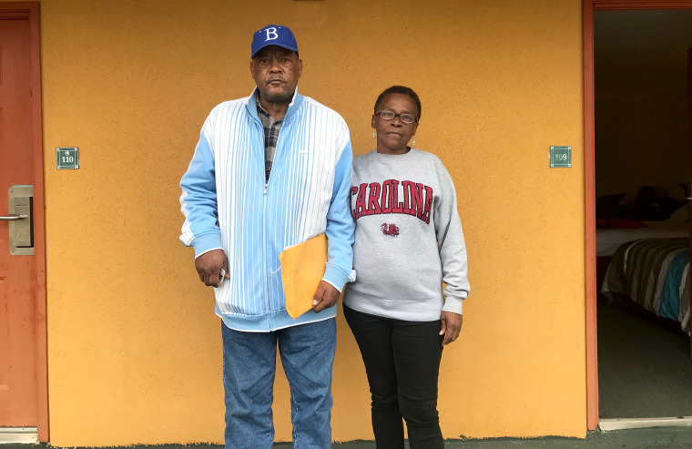 Billy Jeffers and his neighbor Mary Barnes at the hotel where they stayed after being forced to evacuate Allen Benedict Court.