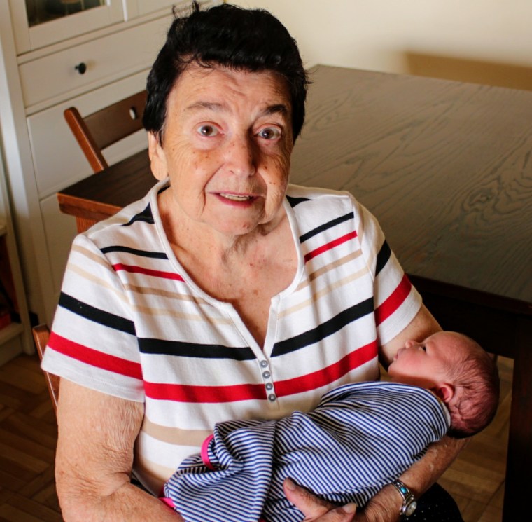 Ronya Gutman cradles her great-granddaughter, Carolina.