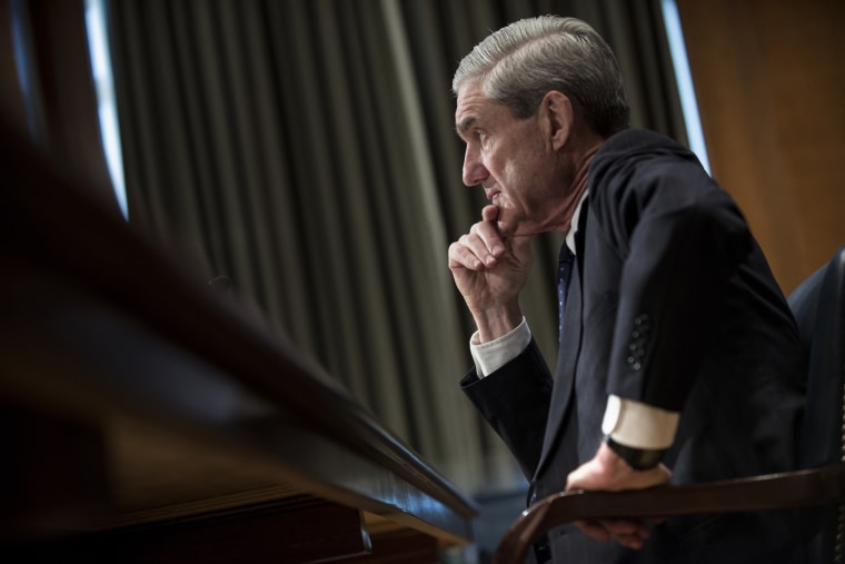 Robert Mueller, then the FBI director, testifies at a Senate hearing on May 16, 2013.