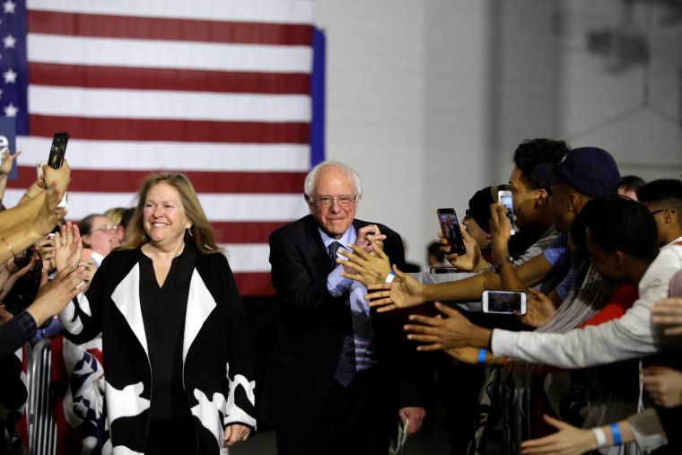 Image: 2020 U.S. presidential candidate and U.S. Senator Bernie Sanders and his wife Jane O'Meara Sanders acknowledge the crowd