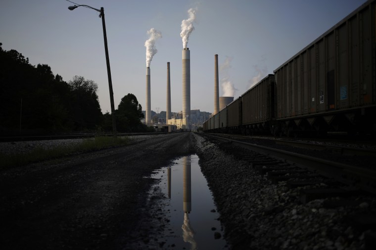 Image: Emissions rise from the American Electric Power Co. Inc. coal power plant in Winfield, West Virginia, on July 31, 2014.