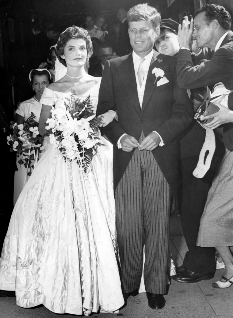 Image: Jackie Kennedy and John F. Kennedy leave St. Mary's Church after their wedding ceremony in Newport, Rhode Island, on Sept. 12, 1953.