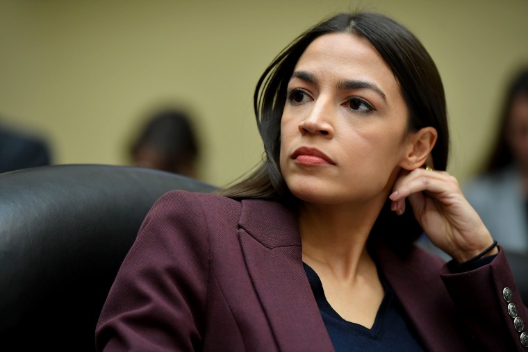 Image: Rep. Alexandria Ocasio-Cortez, D-NY, listens at a hearing on Capitol Hill on Feb. 27, 2019.