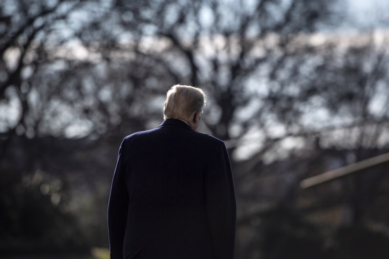 Image: President Donald Trump walks on the South Lawn of the White House on Dec. 7, 2018.