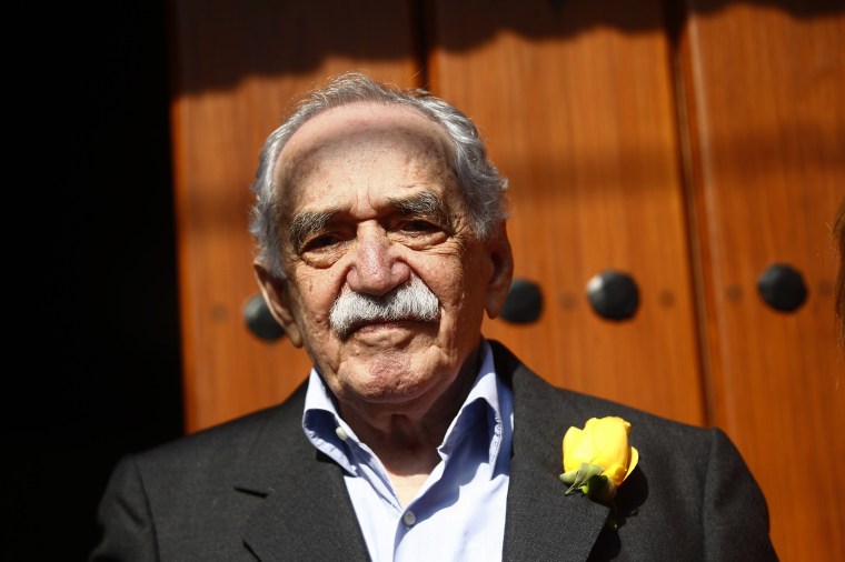 Gabriel Garcia Marquez stands outside his house on his 87th birthday in Mexico City
