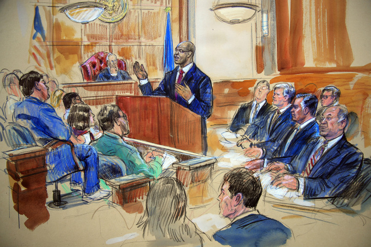 Image: Paul Manafort, seated second row from right, listens as Assistant U.S. Attorney Uzo Asonye makes opening arguments during Manafort's trial in 2018.