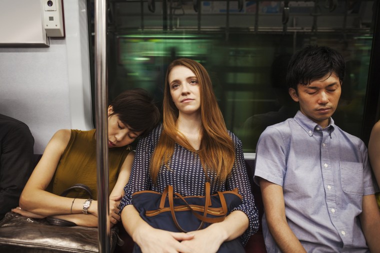 Image: Tired commuters