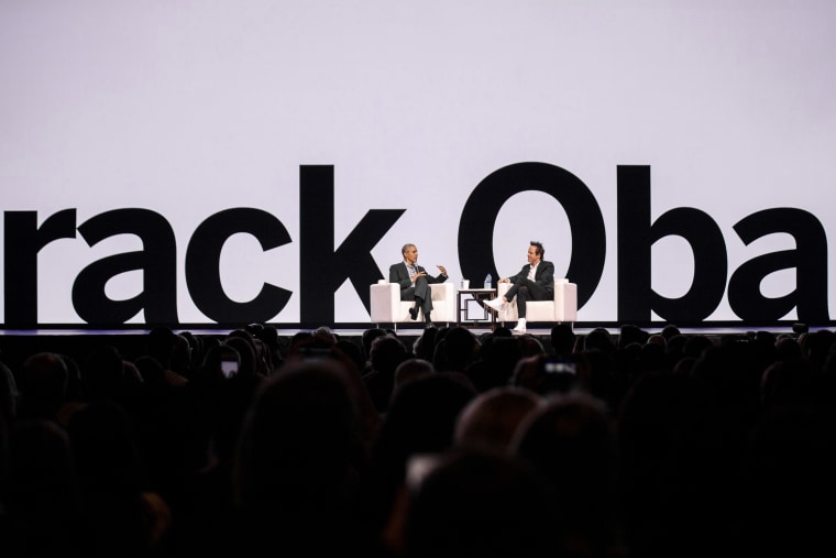 Image: Former President Barack Obama speaks with Qualtrics co-founder and CEO Ryan Smith during the company's annual user summit at the Salt Palace Convention Center on March 6, 2019.
