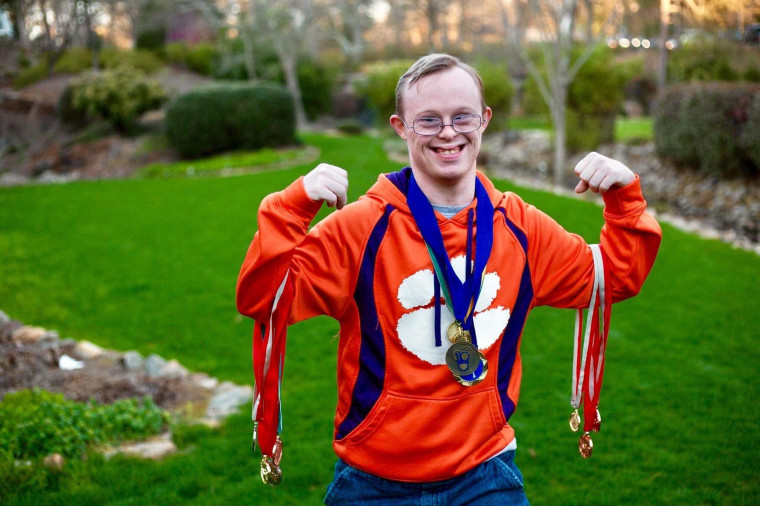 Rion Holcombe with medals