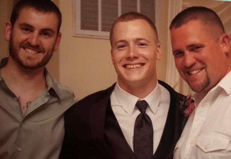 Jonathan (left) and Stephen Full (right) with their step brother, Joshua, a marine who passed recently. They honor him by spreading awareness about PTSD.