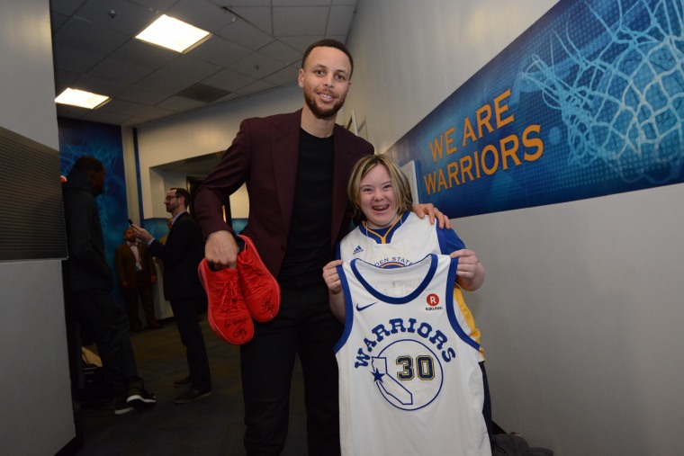 Rachel Grace with basketball player Stephen Curry