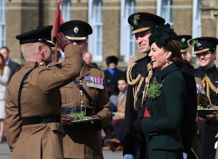 The Duke and Duchess present fresh shamrock to the Irish Guards on St. Patrick's Day.