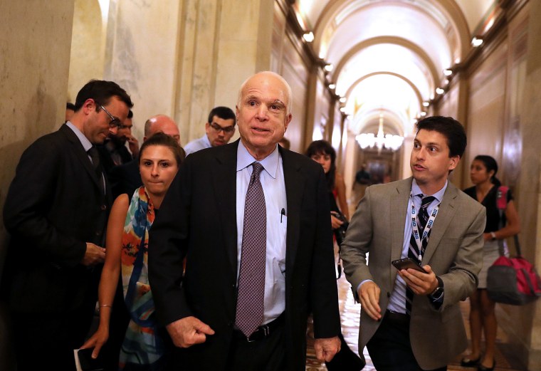 Image: Sen. John McCain, R-Ariz., leaves the Senate chamber at the U.S. Capitol after voting on the GOP \"Skinny Repeal\" health care bill