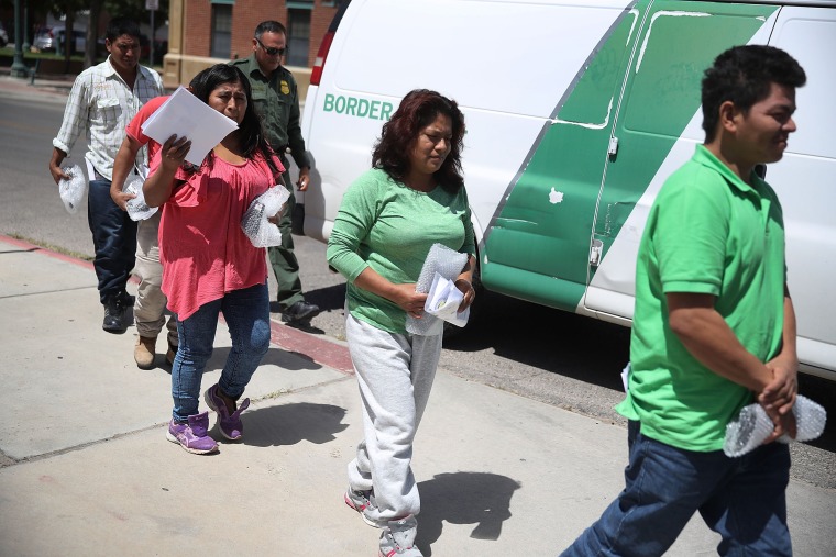 Image: Migrant parents separated from their children by U.S Customs and Border Patrol arrive at the Annunciation House migrant shelter