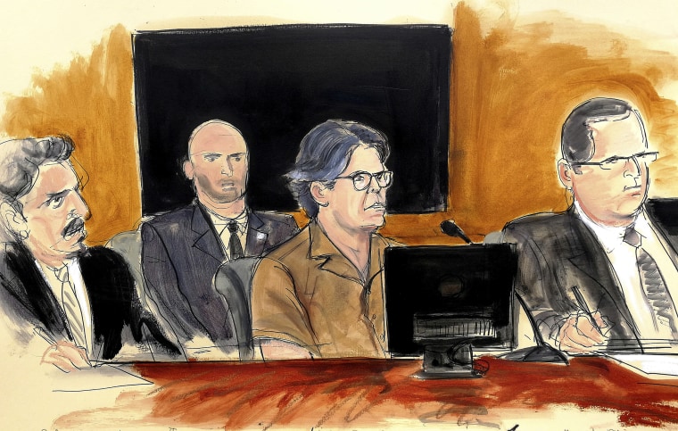 Image: Keith Raniere, second from right, leader of the secretive group NXIVM, attends a court hearing on April 13, 2018, in the Brooklyn borough of New York.