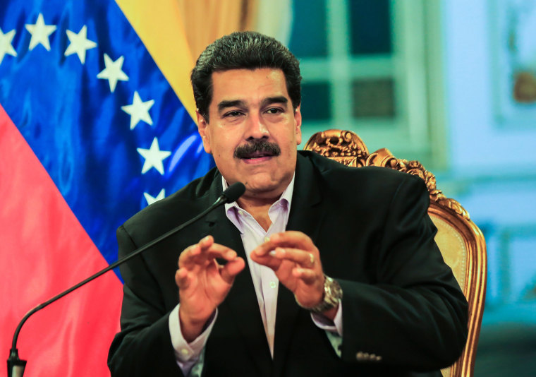 Image: Venezuelan President Nicolas Maduro talking  during a meeting with Venezuelan diplomats